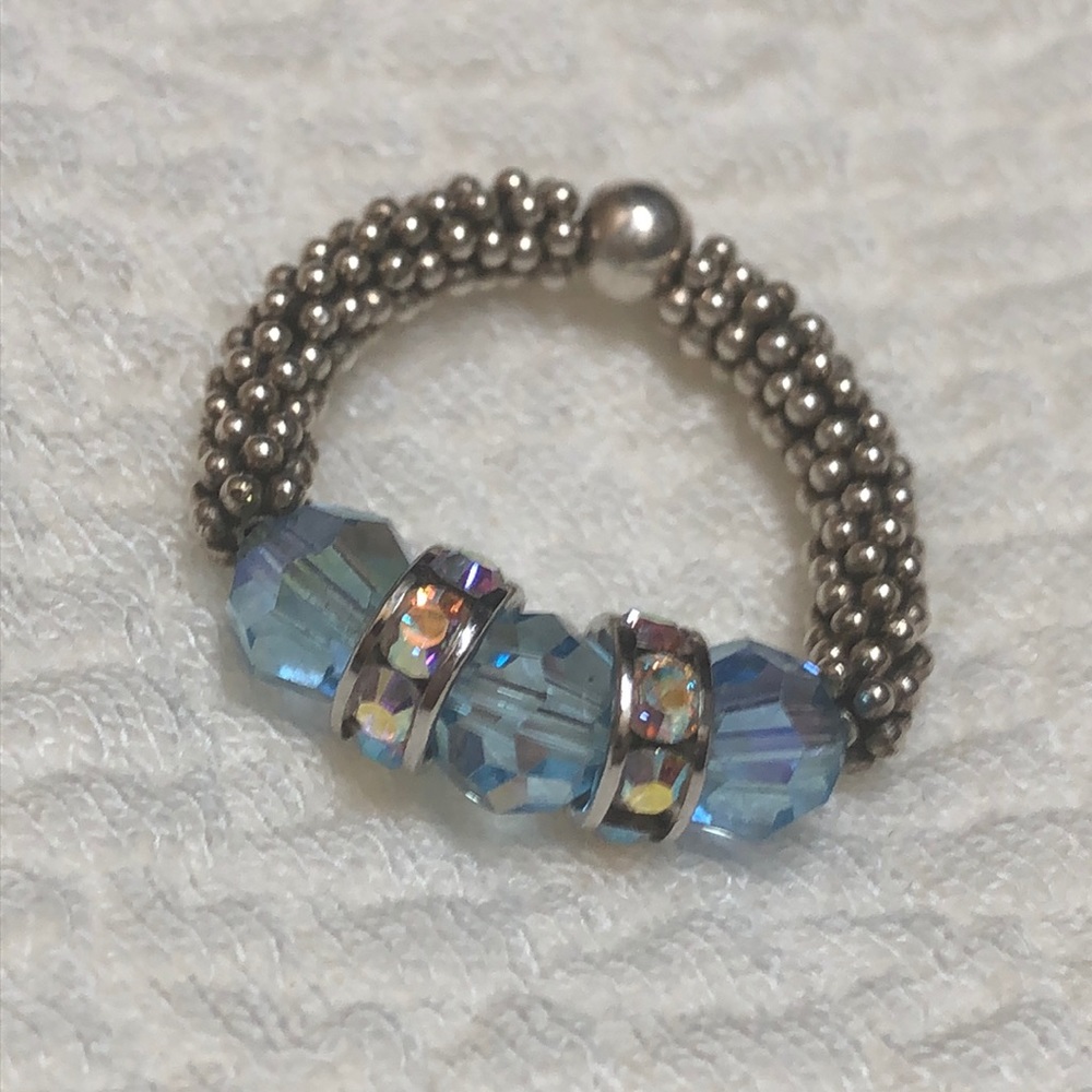 Flexible light blue mesh ring